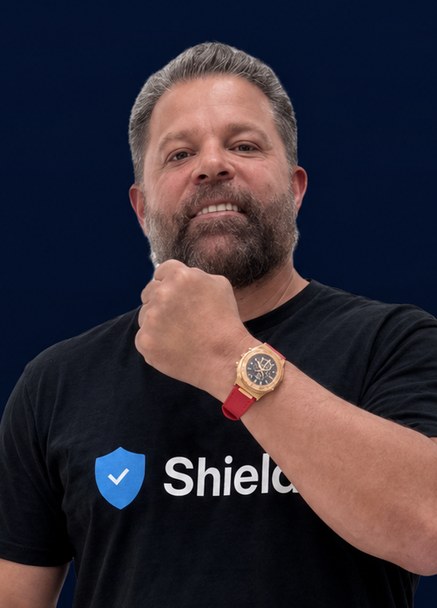 Carlos Marcelin wearing a Shield T-shirt.