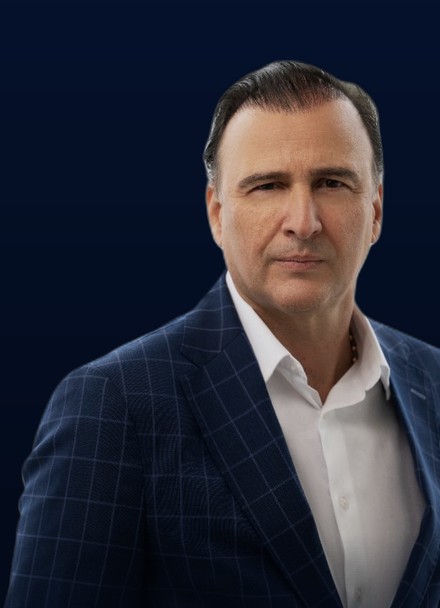David Arredondo in a navy check blazer.
